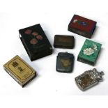 Four matchbox holders and three vesta cases