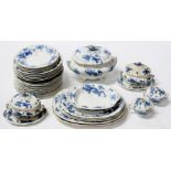 A Booths blue & white part dinner service decorated with dragons and flowers, to include tureens and