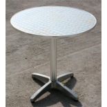 A modern design metal garden or conservatory table, 70cms (27.5ins) diameter.