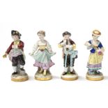 A group of four Aelteste Volkstedter porcelain figures, 13cms (5ins) high (4). Condition Report