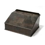 An 18th century oak bible box, the sloped top carved with the initials 'A C' and dated 1731, 70cm (