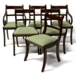 A set of six Regency style mahogany dining chairs including two carvers.