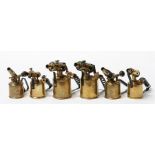 Six brass blow lamps, the largest 20cms (8ins) high.