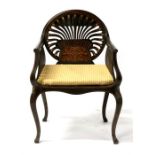 An Edwardian inlaid mahogany carver chair, the pierced back with central foliate scroll inlay, on