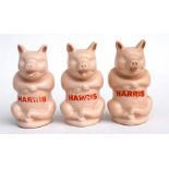 A group of three 1950's Harris Sausages promotional piggy banks, 12cm (4.75 ins) high. Condition