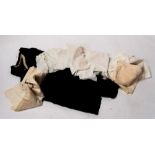 A quantity of vintage clothing, to include a Victorian mourning cape and a mid 20th century