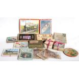 A quantity of vintage Victory and other jigsaw puzzles; together with a quantity of children's