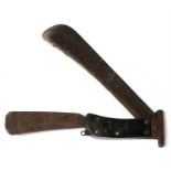 A rare WWII Royal Air Force folding machete issued to RAF pilots as part of their bail-out kit. Made