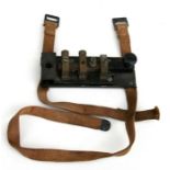 A WW2 J.H.Bunnell & Co of New York telegraph key with straps for strapping to the thigh.