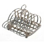 A George III silver six-division toast rack, London 1817, 15cms (6ins) wide. Condition Report