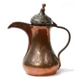 A large tinned copper Turkish / Islamic dallah coffee pot, 41cms (16ins) high.