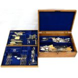 A Goldsmith's & Silversmith's oak cutlery box containing assorted flatware.