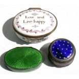 A silver guilloche oval pill box; together with an enamelled silver pill box; and a Halcyon Days