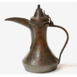 A Turkish / Islamic copper dallah coffee pot, 32cms (12.5ins) high.