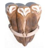 A Royal Copenhagen wall pocket in the form of three barn owls, designed by Christian Thomsen,