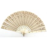 An 18th/19th century bone brise fan. 21cm (8.25ins) high