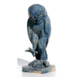 A French blue glazed Studio Pottery figure of an owl holding three rats, stamped 'Massieraine',
