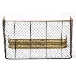 A 19th century wire work and brass nursery fender, 111cms (43.5ins) wide; together with a 19th