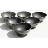 A group of six 18th century pewter bowls, 13cms (5.1ins) diameter.