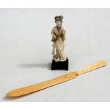 A Chinese ivory figure depicting a robed woman, 11cms (4.25ins) high (lacks hands); together with