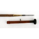 A Makila Basque wolf stick, having a woven leather grip with horn and enamel handle, 'Etsaien