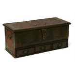A brass mounted teak Zanzibar trunk with three short drawers, 110cms (43.75ins) wide.