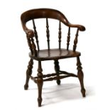 A 19th century ash and elm elbow chair.
