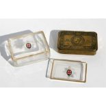 A WWI 1914 Princess Mary Christmas tin; together with a glass lidded box with a Military crest and