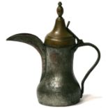 A Turkish / Islamic tinned copper dallah coffee pot with brass cover, 38cms (15ins) high.