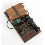 A British military telegraph key by an unknown manufacturer with War Department marked dry cell