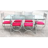 A glass & painted metal conservatory table with six matching chairs including two carvers, 100 by