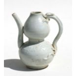 A Chinese pale green glazed ewer with dragon handle, 12.5cms (5ins) high. Condition Report Good