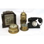 A black Bakelite telephone; an oak cased mantle clock; two brass clocks and a barometer (5).