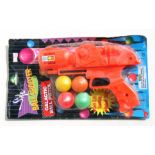 A Soft Ball Shooter Galactic Ball Pistol in original packaging, made in China. 22cms (8.75ins) long