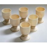 A set of six late 19th/ early 20th century turned ivory egg cups, 6.5cm (2.5ins) high