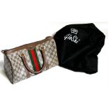 A Gucci ladies handbag.