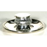 An Edwardian silver cut glass inkwell and stand, London 1902, 18cm (7ins) diameter. Condition Report