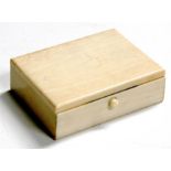 An Art Deco rectangular form ivory dressing table box, 11cm (4.25ins) wide