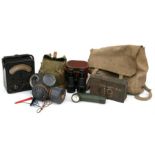 A pair of French Lumiere of Paris binoculars marked War Office Model in its leather case with