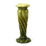 A late 19th century green glazed Leeds Art Pottery jardiniere stand, 76cm (30ins) high. Condition