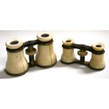 A pair of late 19th century ivory and brass opera glasses together with a smaller pair, (2)