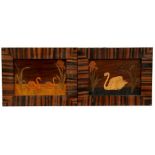 A pair of inlaid panels depicting swans, mounted in figured rosewood frames, 34cm x 27cm (13.5ins