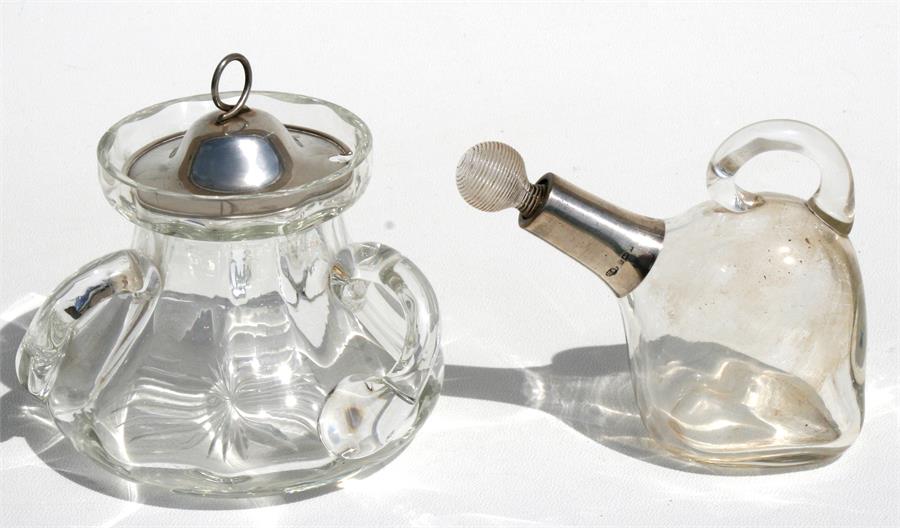 A three-handled glass preserve jar with silver lid, Birmingham 1911, 11cms (4.25ins) high;