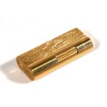 A gold plated Dunhill lighter with bark effect decoration, 6.5cm (2.5ins) high