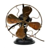 An early 20th century brass bladed electric fan, 31cm (12.25ins) high