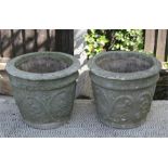 A pair of reconstituted stone planters, 37cm (14.5ins) diameter.