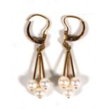 A pair of 14ct gold & pearl drop earrings.