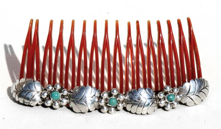 A white metal & turquoise mounted hair slide, 8.5cm (3.25ins) wide.