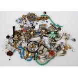 A quantity of costume jewellery, to include necklaces and brooches.