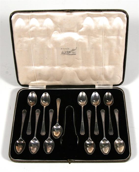 A cased set of 12 silver teaspoons, with sugar tongs, Sheffield 1935.